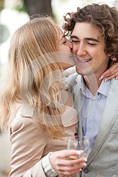 Romantic couple drinking champagne