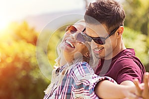 Romantic couple embracing at park