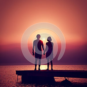 Romantic Couple Enjoying Sunset at Sea.