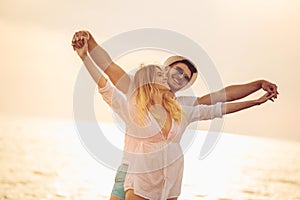 Romantic couple having fun on the beach.