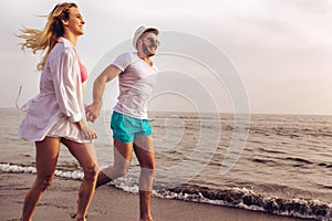 Romantic couple having fun on the beach.