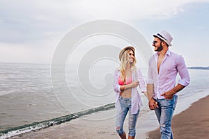 Romantic couple having fun on the beach.