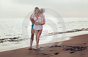 Romantic couple having fun on the beach.