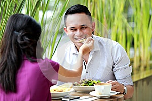 Romantic couple having lunch together