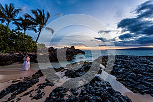 Romantic couple Hawaii beach sunset