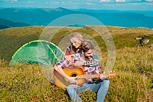 Romantic couple holding hands traveling together camping in mountains healthy lifestyle concept active vacations outdoor