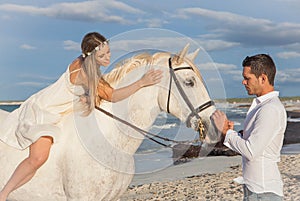 Romantic couple with horse