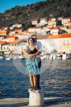Romantic couple hugging on the beach.Having a fun romantic date.Celebrating anniversary.Valentines day