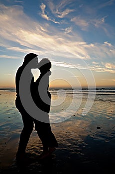 Romantic couple kiss on the beach