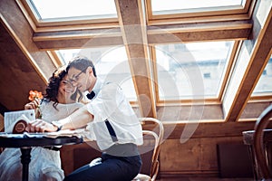 Romantic couple in love bonding in cafe