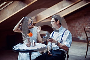 Romantic couple in love bonding in cafe