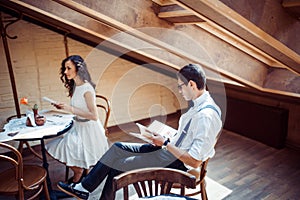 Romantic couple in love bonding in cafe