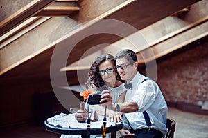 Romantic couple in love bonding in cafe