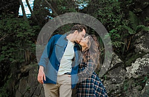 Man and woman in love on the lake in mountain