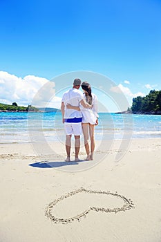 Romantic couple in love have fun on the beach