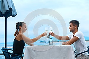 Romantic Couple In Love Having Dinner At Sea Beach Restaurant