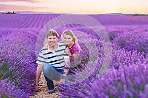 Romantic couple in love in lavender fields in