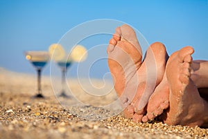 Romantic couple lying on a beach