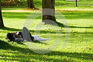 Romantic couple lying on the grass