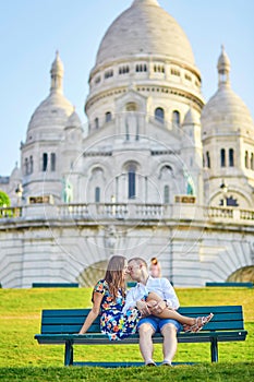 Romantic couple near Sacre-Coeur cathedral on Montmartre, Paris