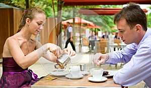 Romantic couple in Paris, having breakfast
