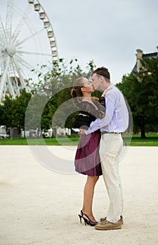 Romantic couple in Paris kissing