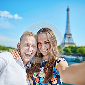 Romantic couple in Paris on a summer day