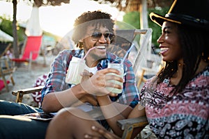 Romantic happy couple relaxing on the beach together