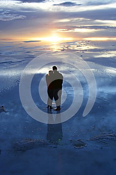 Romantic couple at sunset on the saltflats