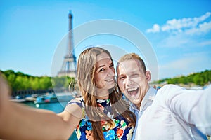 Romantic couple taking selfie in Paris