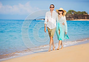 Romantic Couple Walking on the Beach