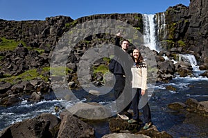 Romantic Couple By a Waterfall