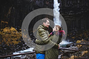 Romantic Couple at Waterfall