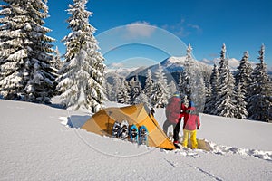 Romantic couple during the winter travel in wilderness