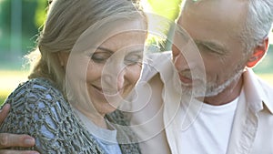 Romantic date, happy senior couple embracing, dating website, love and care photo