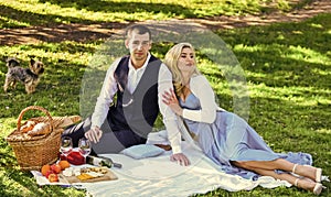 Romantic date. Man and woman in love. Celebrate love. Vintage style. Couple in love enjoying picnic time and food