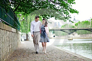 Romantic dating couple is walking by the water