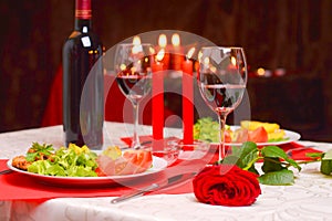 Romantic dinner with candles photo