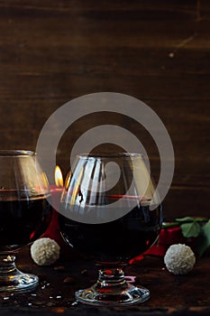 Romantic dinner drink - wine or brendy in glass.