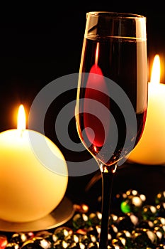 Romantic Dinner - Glass of Red Wine and Candles