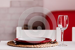 Romantic Dinner at home on the kitchen. Place setting for dinner date celebration wedding