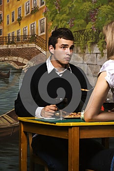 Romantic dinner in pizzeria photo