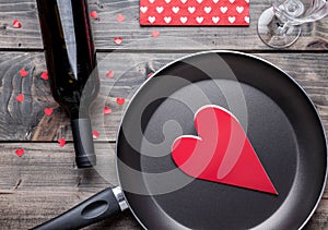 Romantic dinner set on wooden background