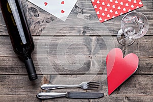 Romantic dinner set on wooden background