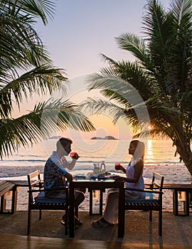 Romantic dinner during sunset on a tropical beach in Thailand, Koh Chang island