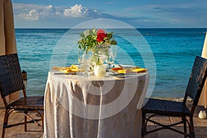 Romantic dinner: table for two and Beach Montego Bay at sunset - Jamaica