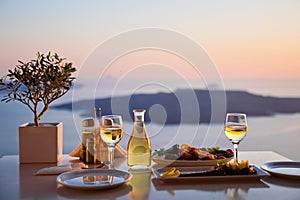 Romantic dinner for two at sunset.Greece, Santorin