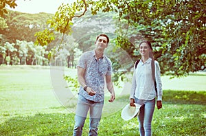 Romantic and enjoying in moment of happiness time,Happy and smiling,Couple young teen lover standing together at public park