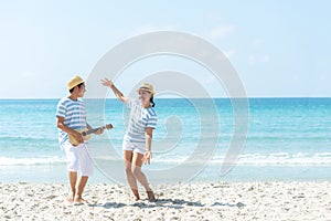 Romantic family asian couples lover relax and dance music enjoy for honeymoon in luxury resort near the beach in Summer holiday.