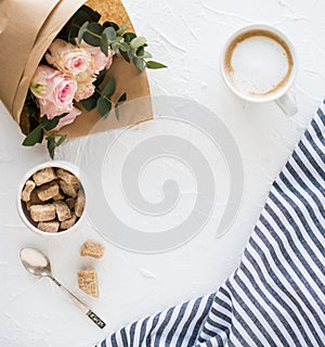 Romantic feminine background with coffee and roses